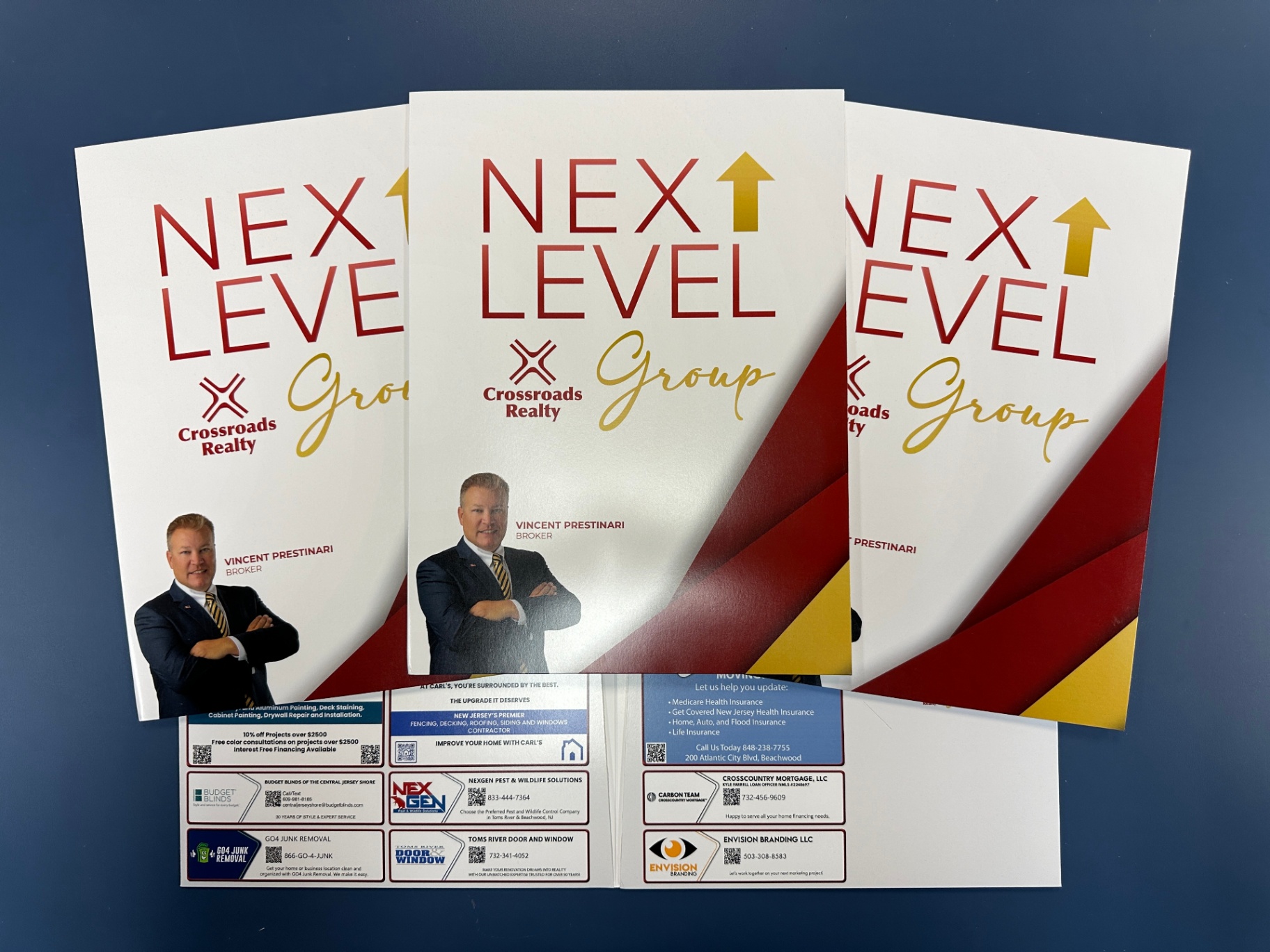 Three custom presentation folders for Crossroads Realty’s Next Level Group