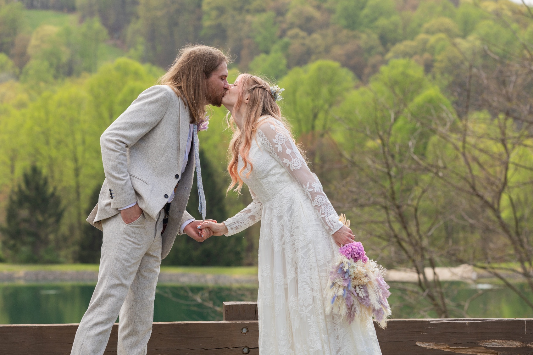 Dani & Kyle share a gentle outdoor kiss