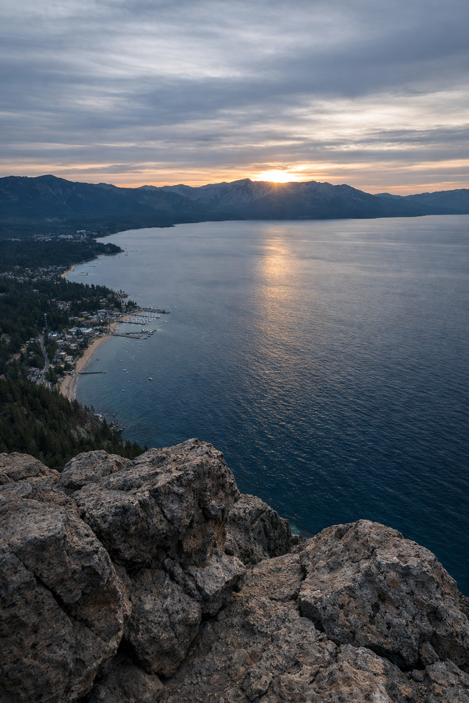 Scenic sunset overlooking the South Shore from Cave Rock, a top Lake Tahoe photography location.