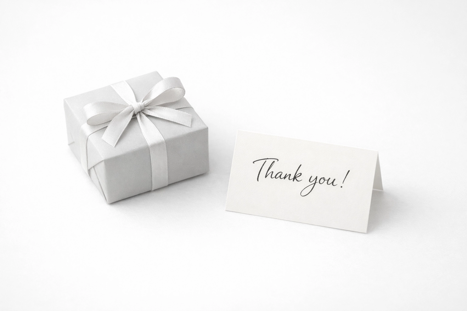Small gift box reward with thank-you card for customer review participation incentive
