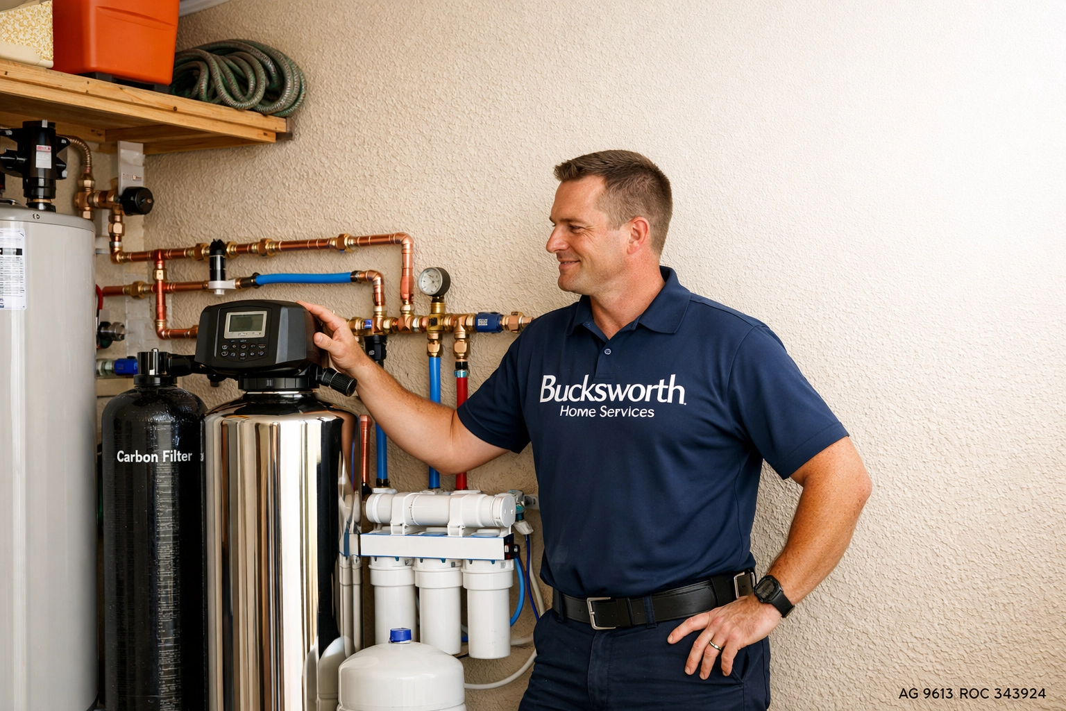 Bucksworth plumber inspecting a reverse osmosis water filtration system in a Mesa Arizona home.