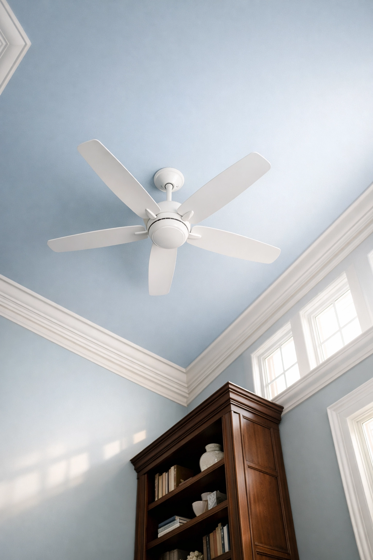 Clean ceiling fan and crown molding after a professional Weekly House Cleaning in Lynnfield.