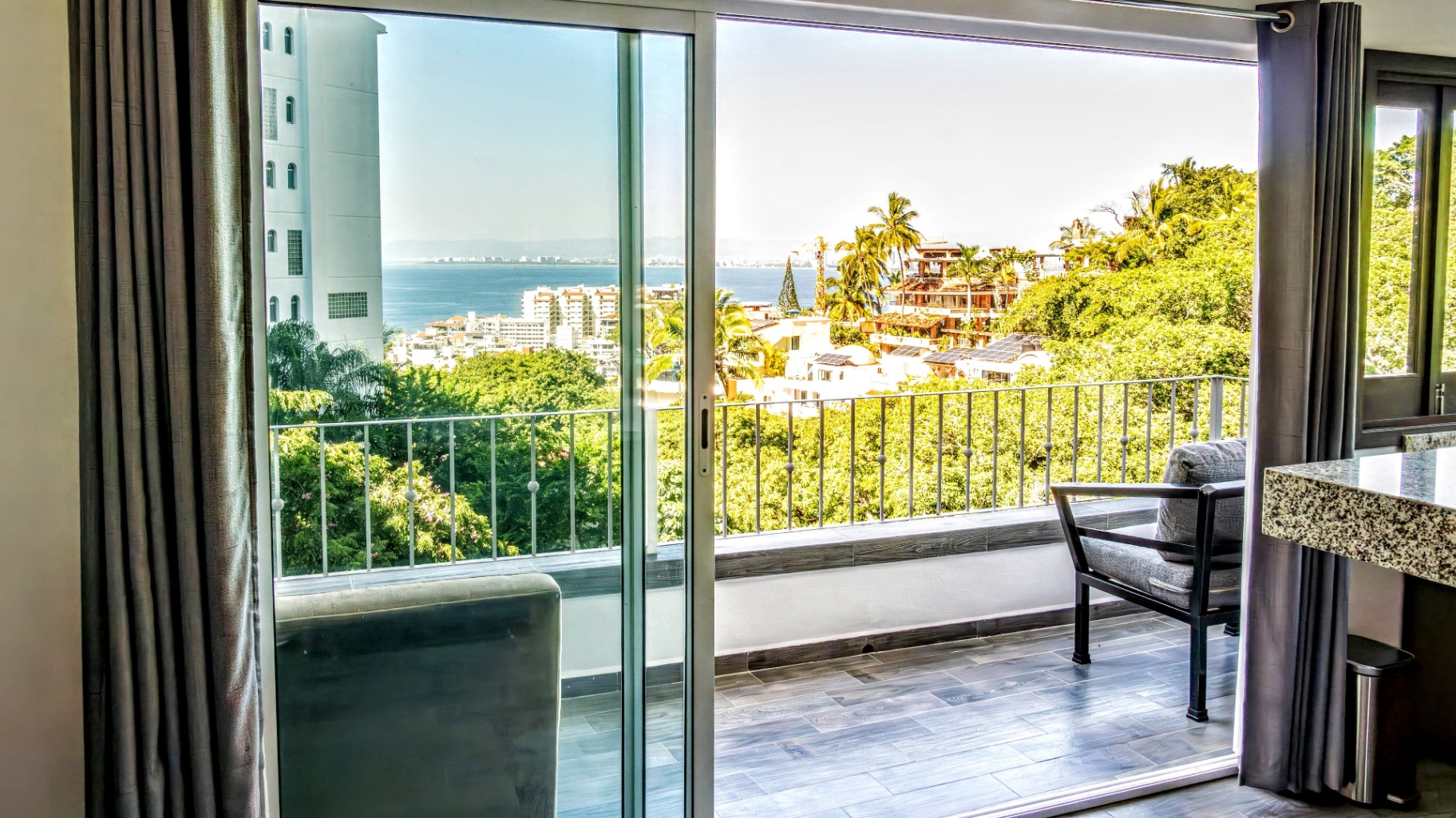 Modern condo balcony with seating