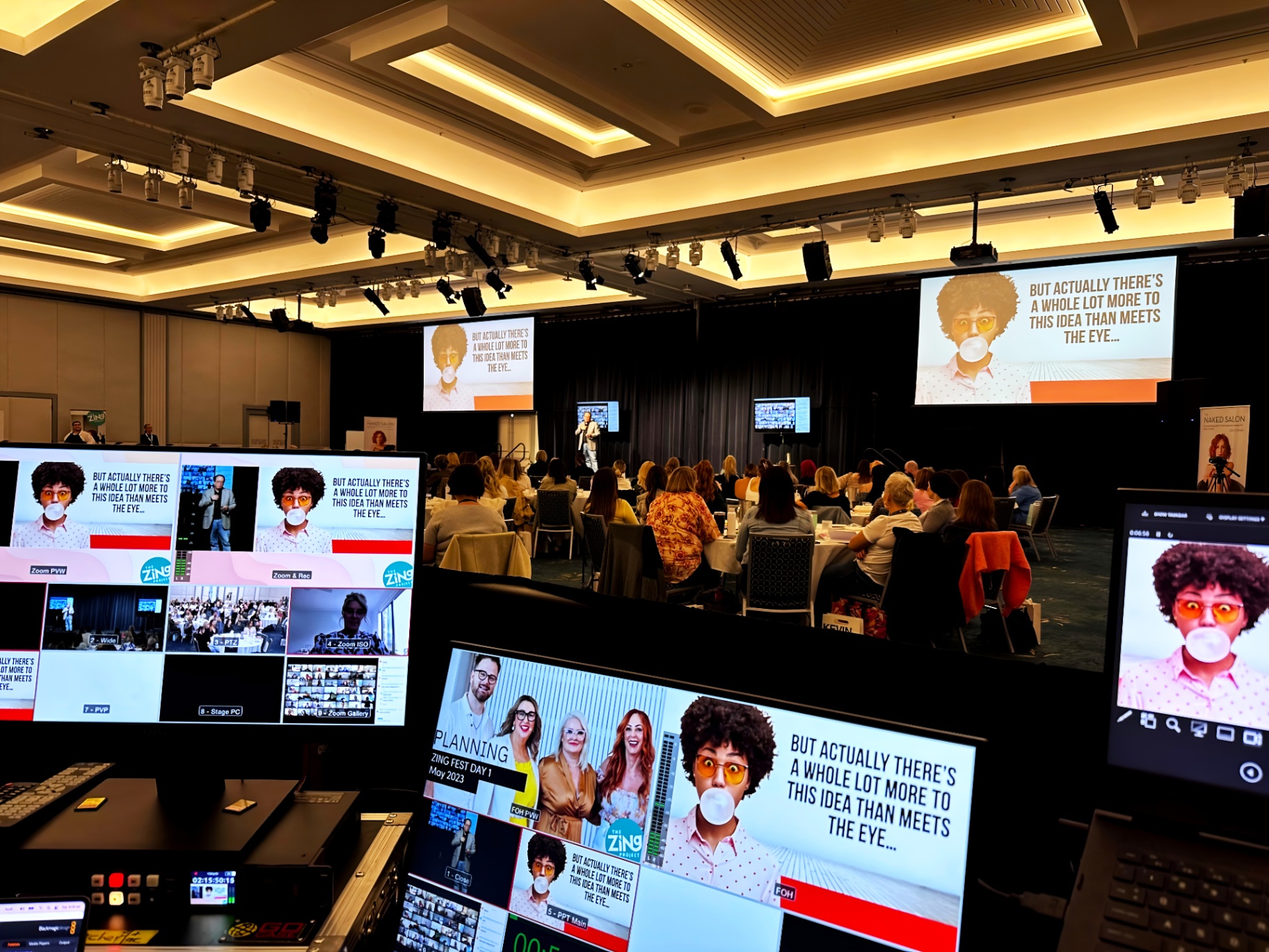 Hybrid conference setup featuring live streaming and LED displays