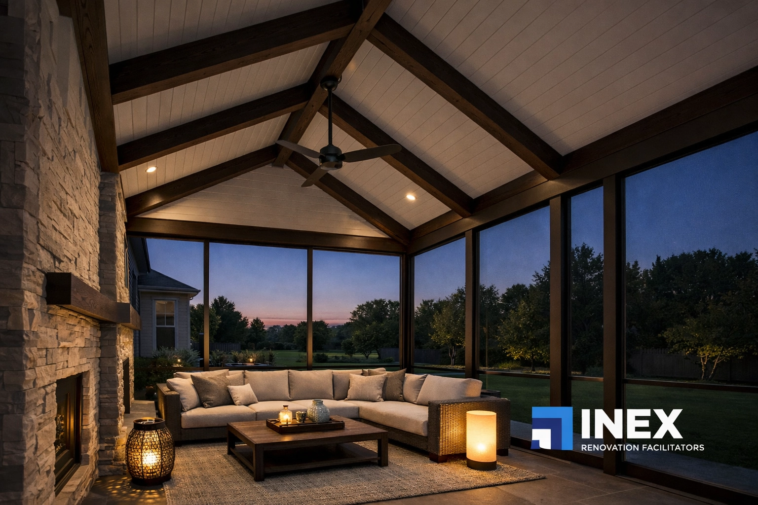 Elegant screened-in porch with vaulted wood beams and cozy seating, creating a functional outdoor living room.