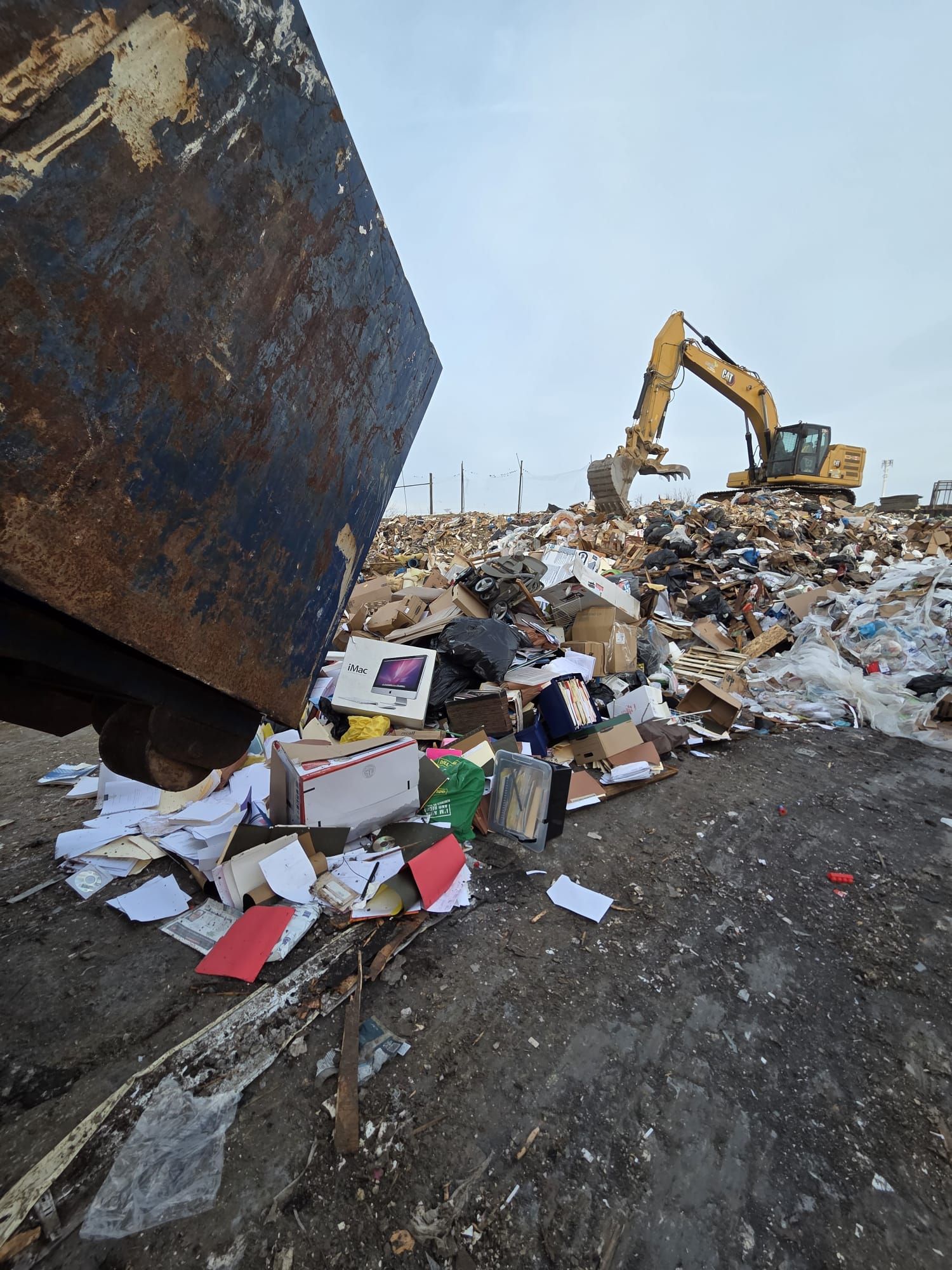 Bin4U dumpster being emptied at a licensed recycling and landfill facility