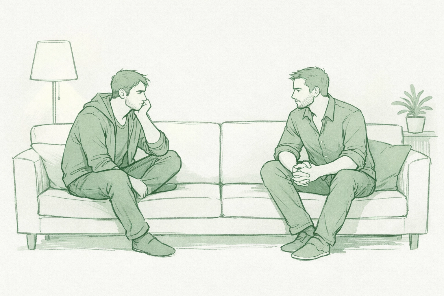 Two men on sofa navigating emotional distance and vulnerability before first intimate connection