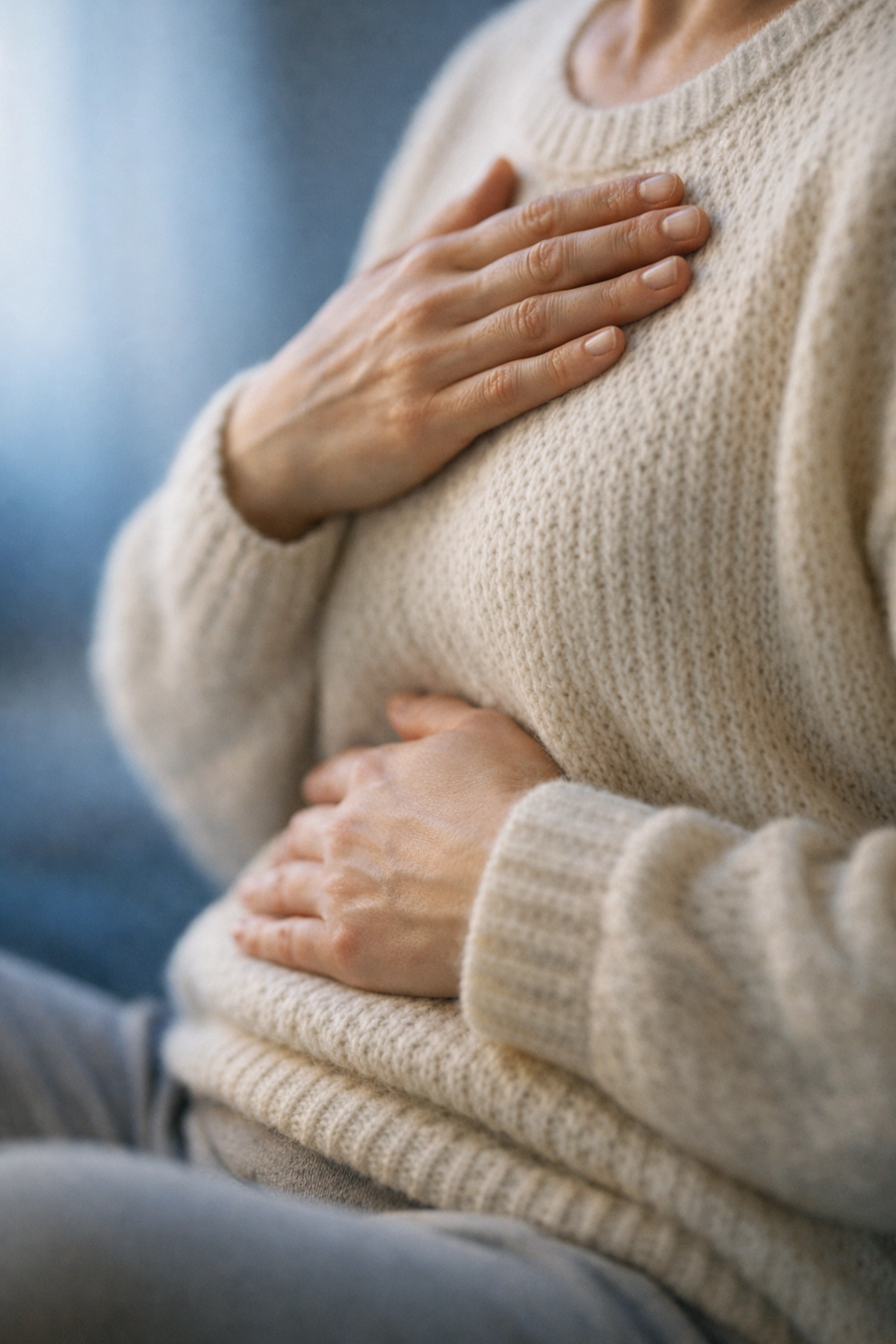 Person practicing grounding techniques for trauma therapy through body awareness and self-regulation