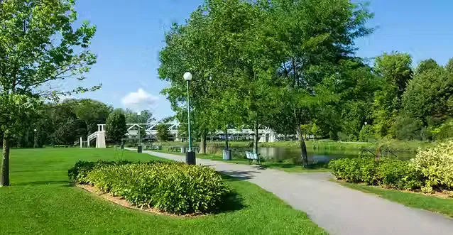 Scenic neighborhood park with walking path representing Brentwood outdoor amenities