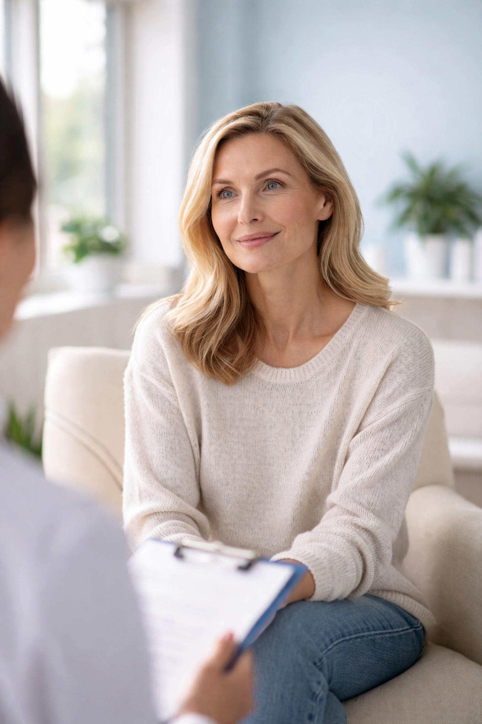 Woman consulting with a hormone specialist at Inside Out Medspa, discussing hormone imbalance symptoms