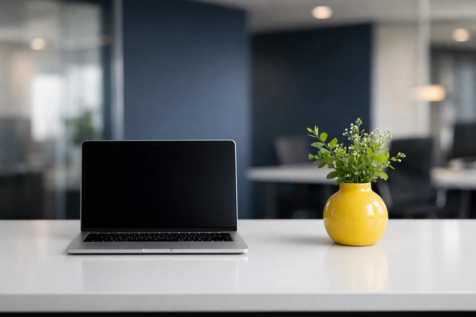 A clutter-free minimalist executive desk showing the benefits of office cleaning in Marlborough.