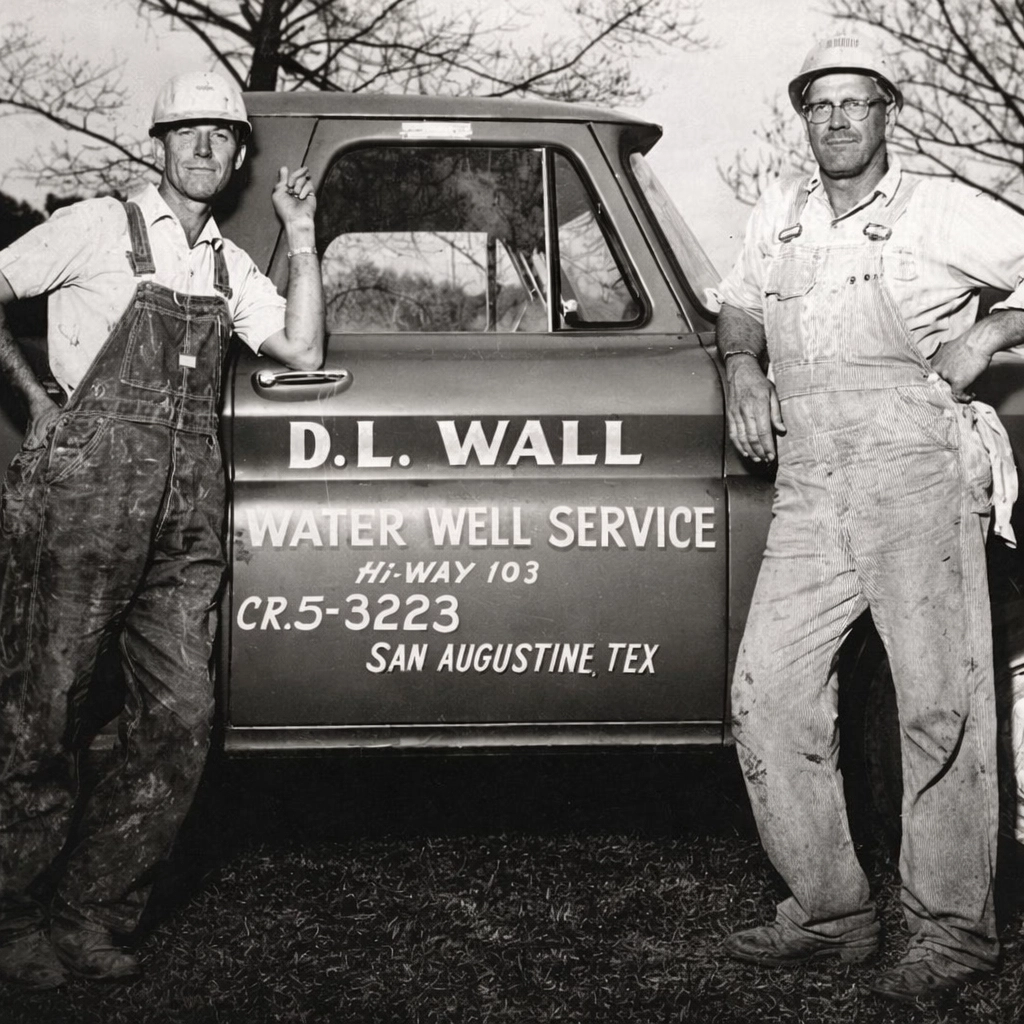 DL Wall with water well service truck after World War II