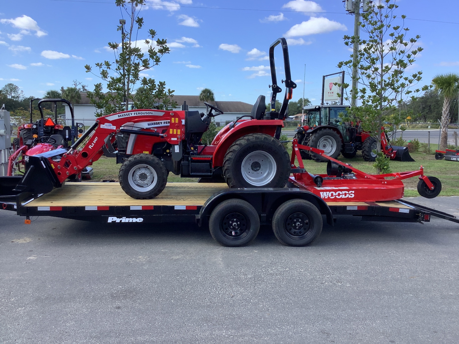 Massey Ferguson compact tractor loaded for delivery