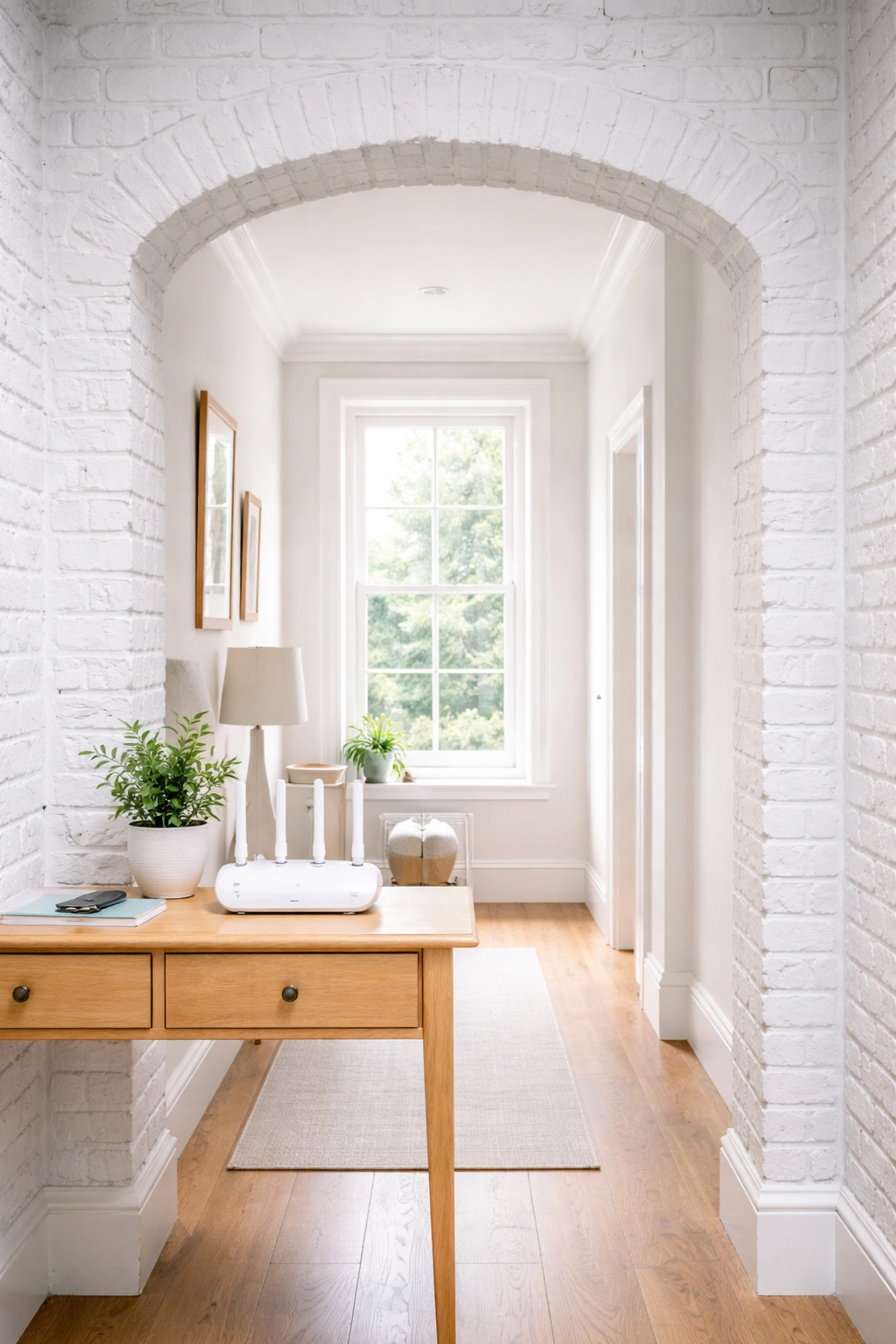 WiFi router on a wooden console in a Victorian London townhouse hallway with thick brick walls, illustrating WiFi challenges in period homes.