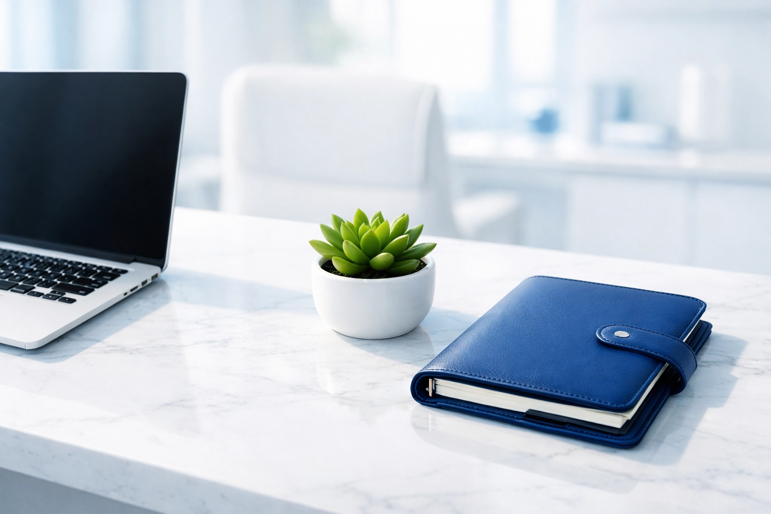 Clean, dust-free marble desk in an airy Western MA office, highlighting the impact of professional janitorial services.