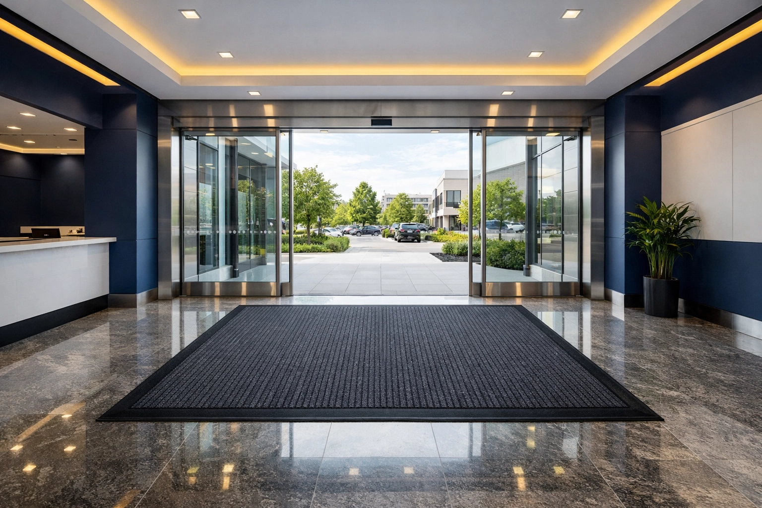 Marlborough commercial cleaning entryway management featuring polished stone floors and heavy-duty mats.