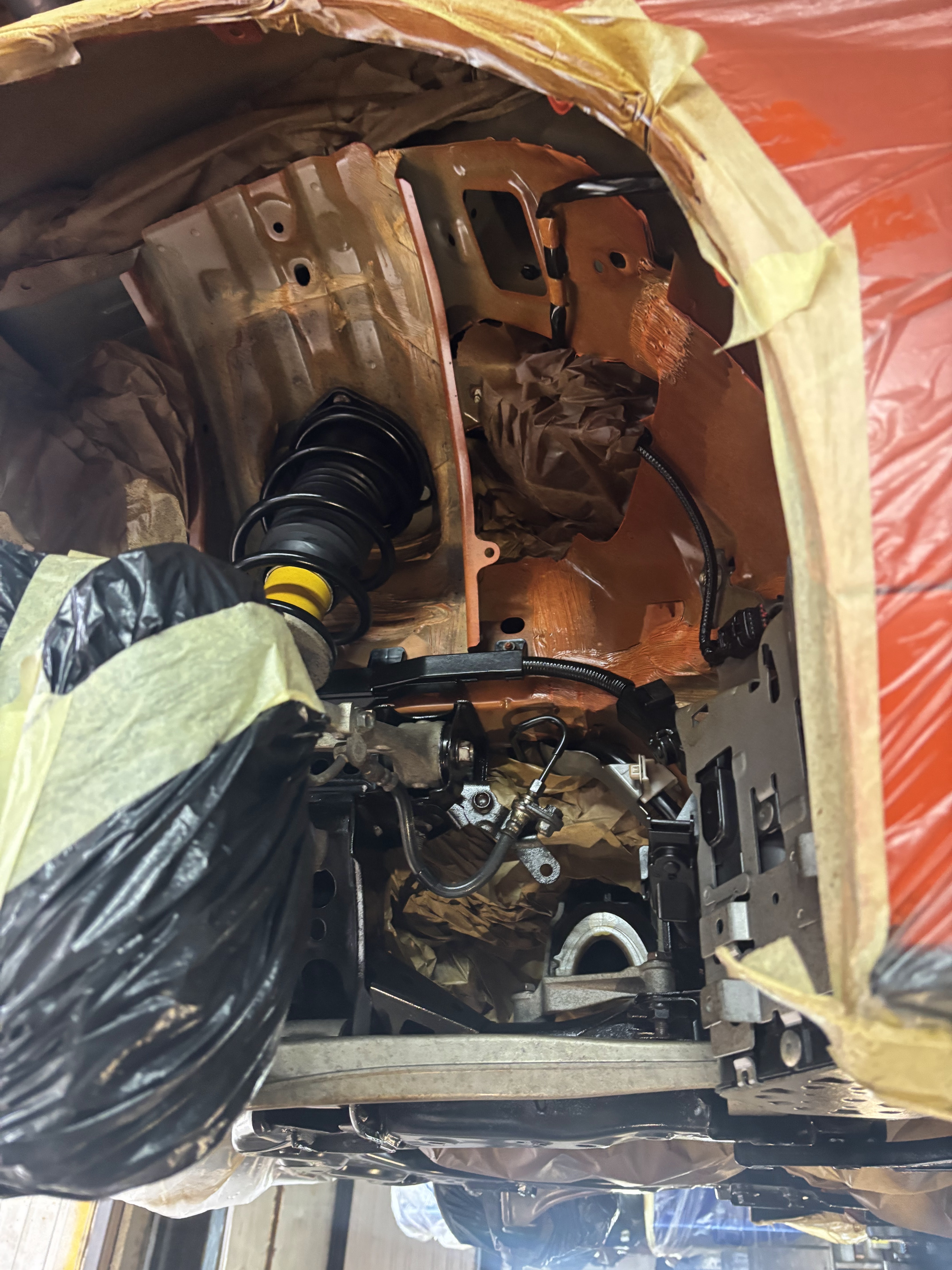 front-wheel-arch-suspension-masking-prep-rust-proofing.HEIC