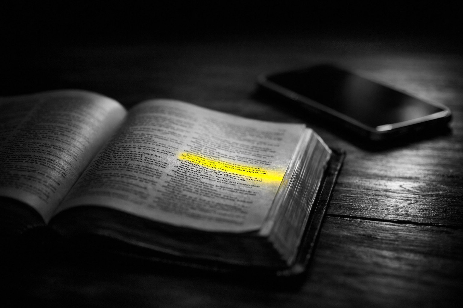 Open Bible next to smartphone showing balance between Scripture and digital ministry