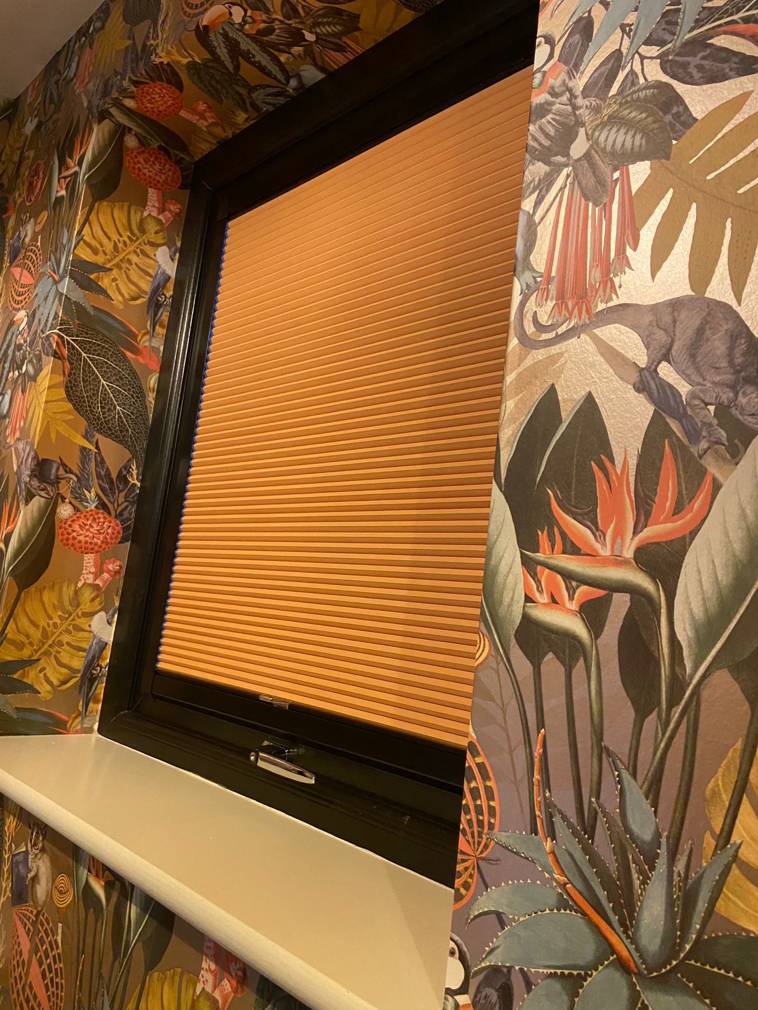 Custom-made honeycomb pleated blind in warm orange