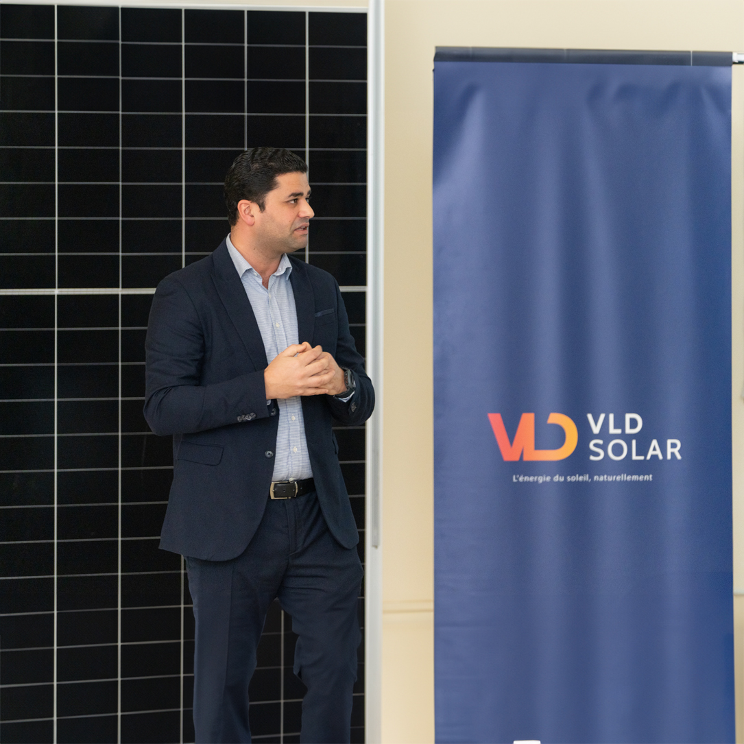VLD SOLAR representative with solar panel