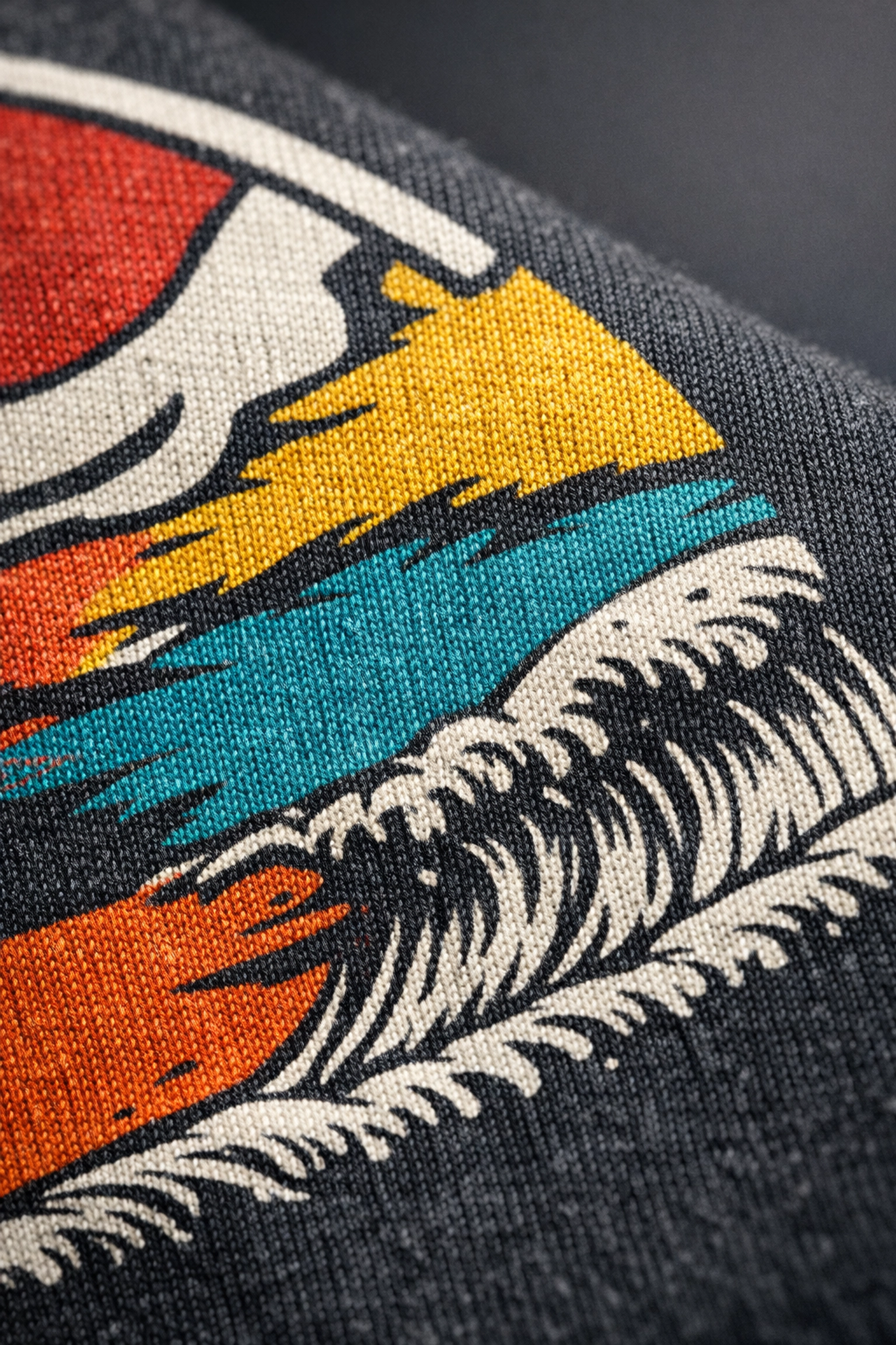 Macro shot of integrated ink on a custom cotton shirt highlighting the soft hand feel of DTG printing services.