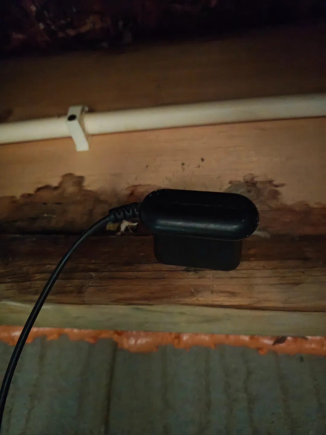 Water detection sensor installed on a wooden joist