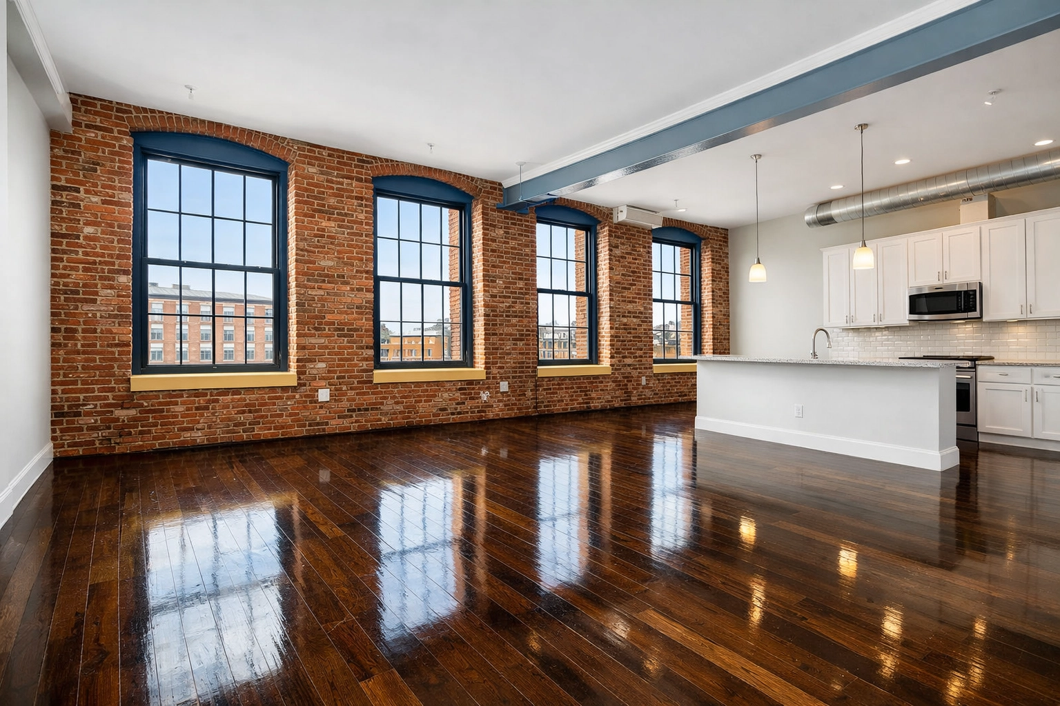 Pristine empty Lowell mill loft apartment after professional move-in/move-out cleaning Lowell service.