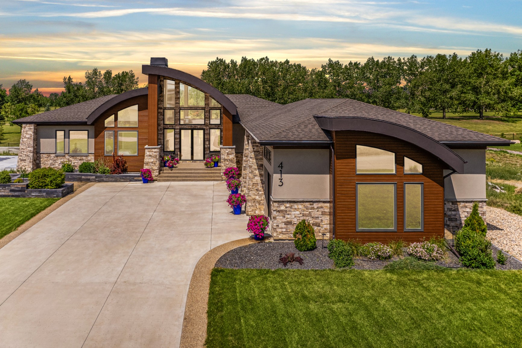 Aerial twilight image of a contemporary luxury home