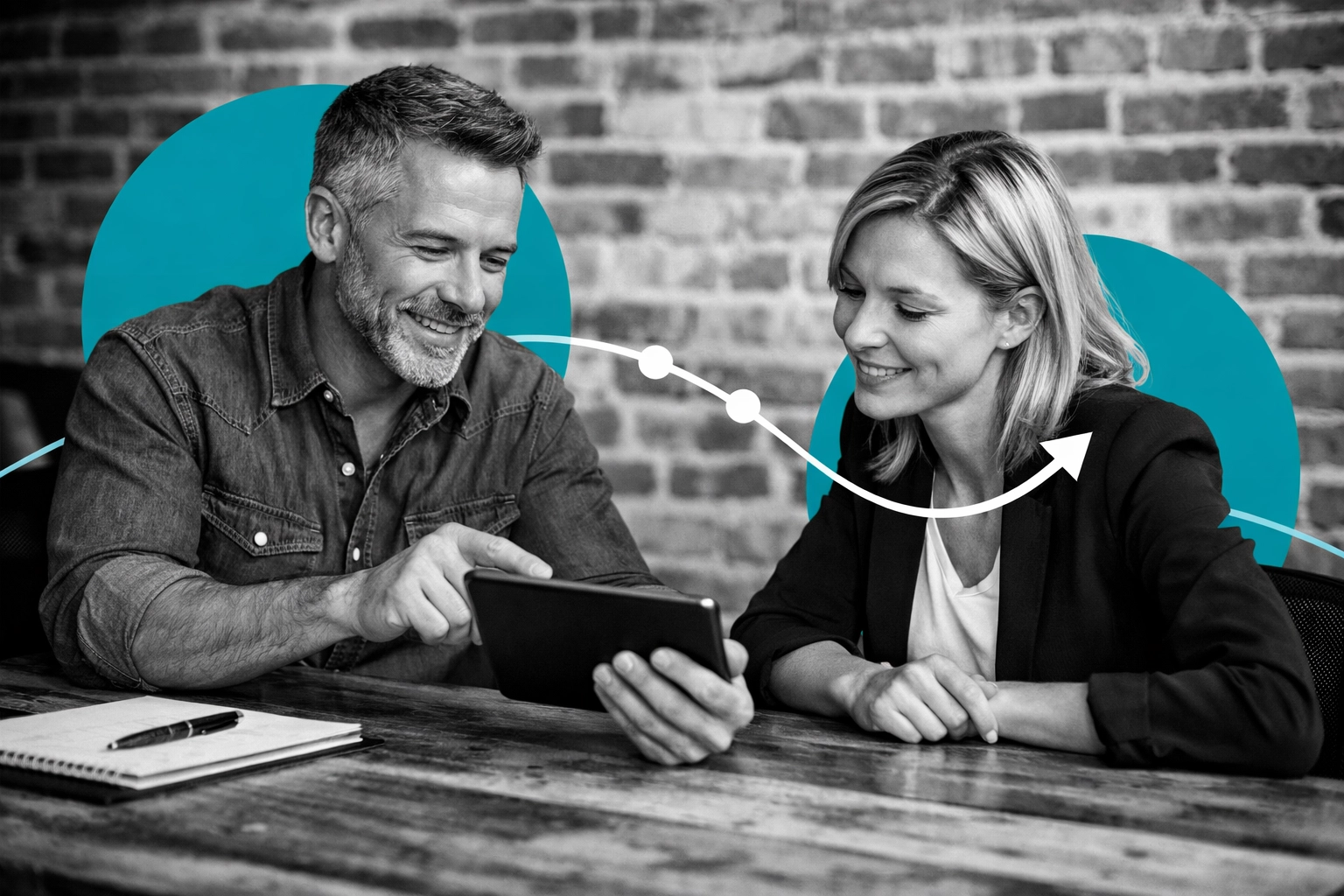 Contractor and client reviewing a digital marketing strategy on a tablet to grow their business.