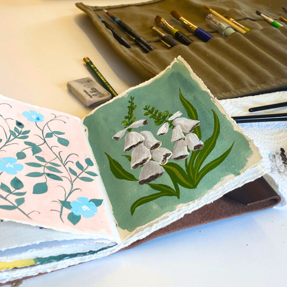 Artist's Sketchbook with Floral Pattern Concepts