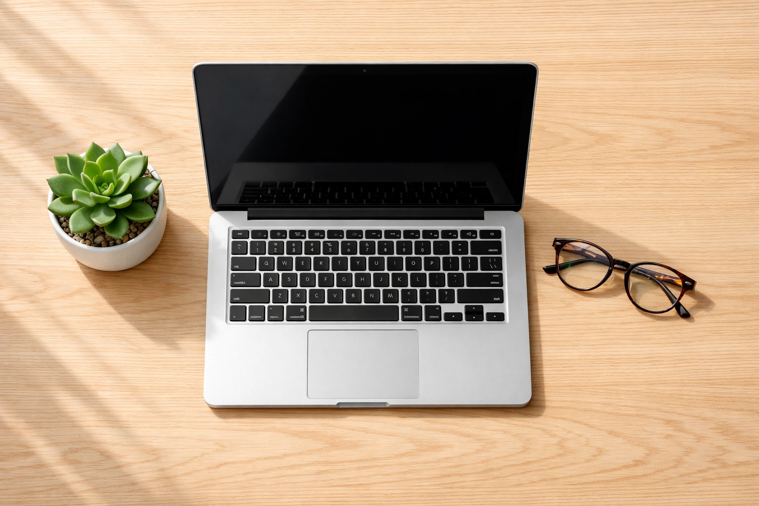 Modern office desk symbolizing ServiceNow ITOM green energy initiatives and ESG compliance.