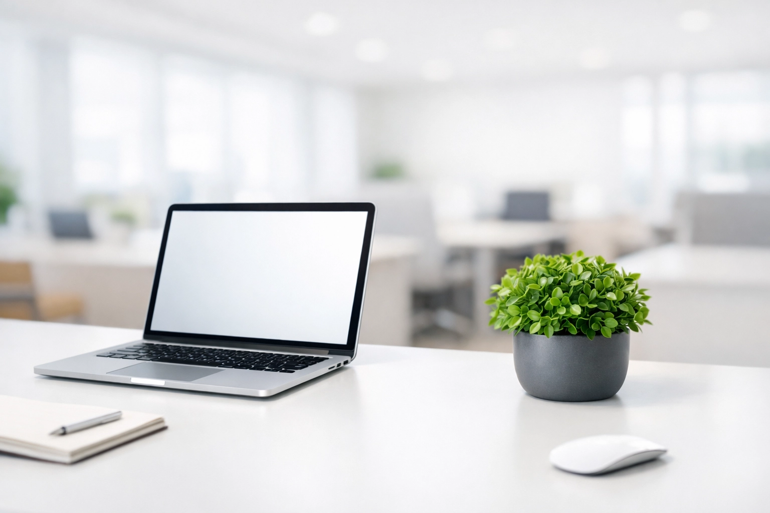 Modern office workstation with a laptop used to prevent tax software errors and manage digital refunds.
