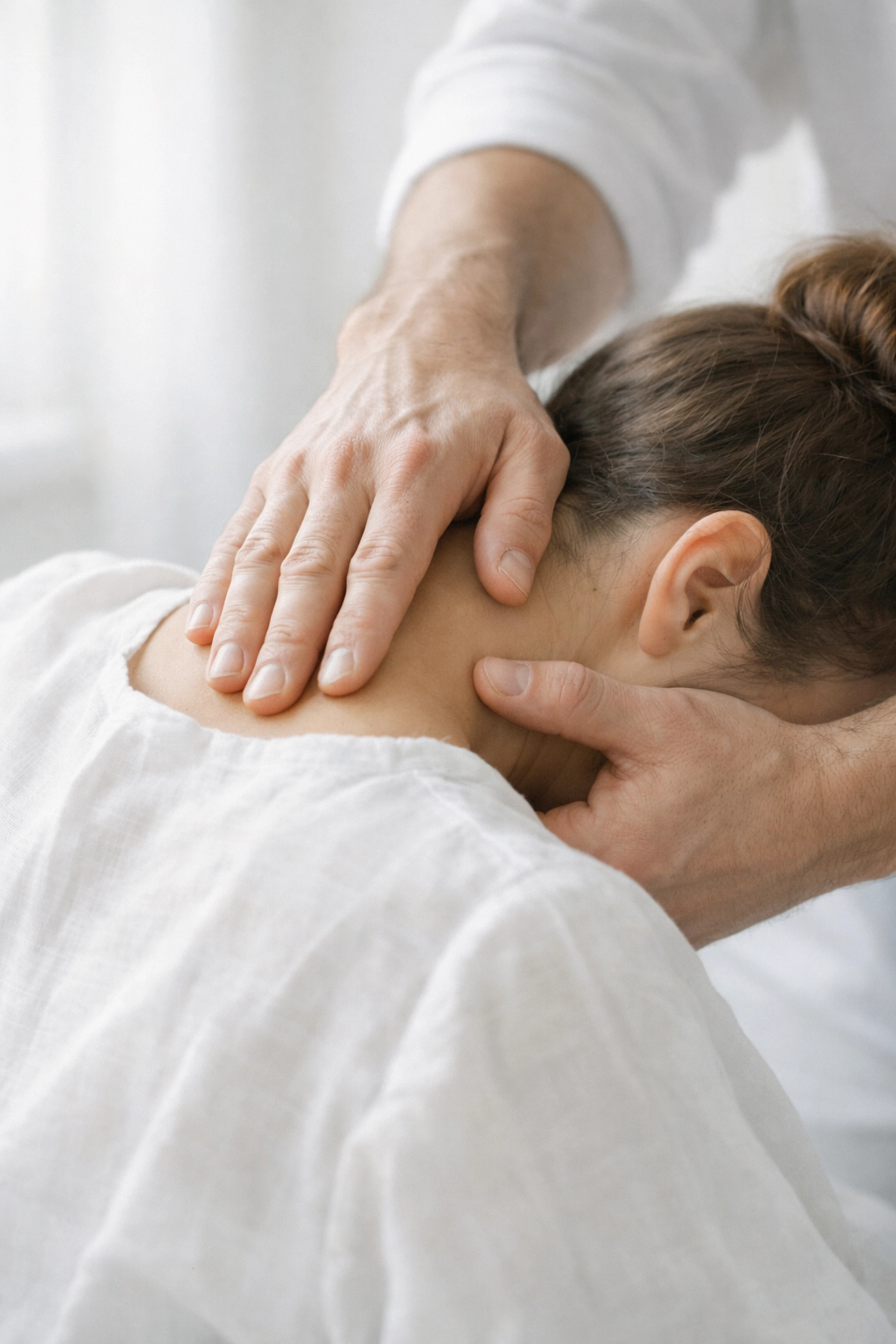 Professional chiropractor performing an adjustment, highlighting expert patient care and clinical healing.