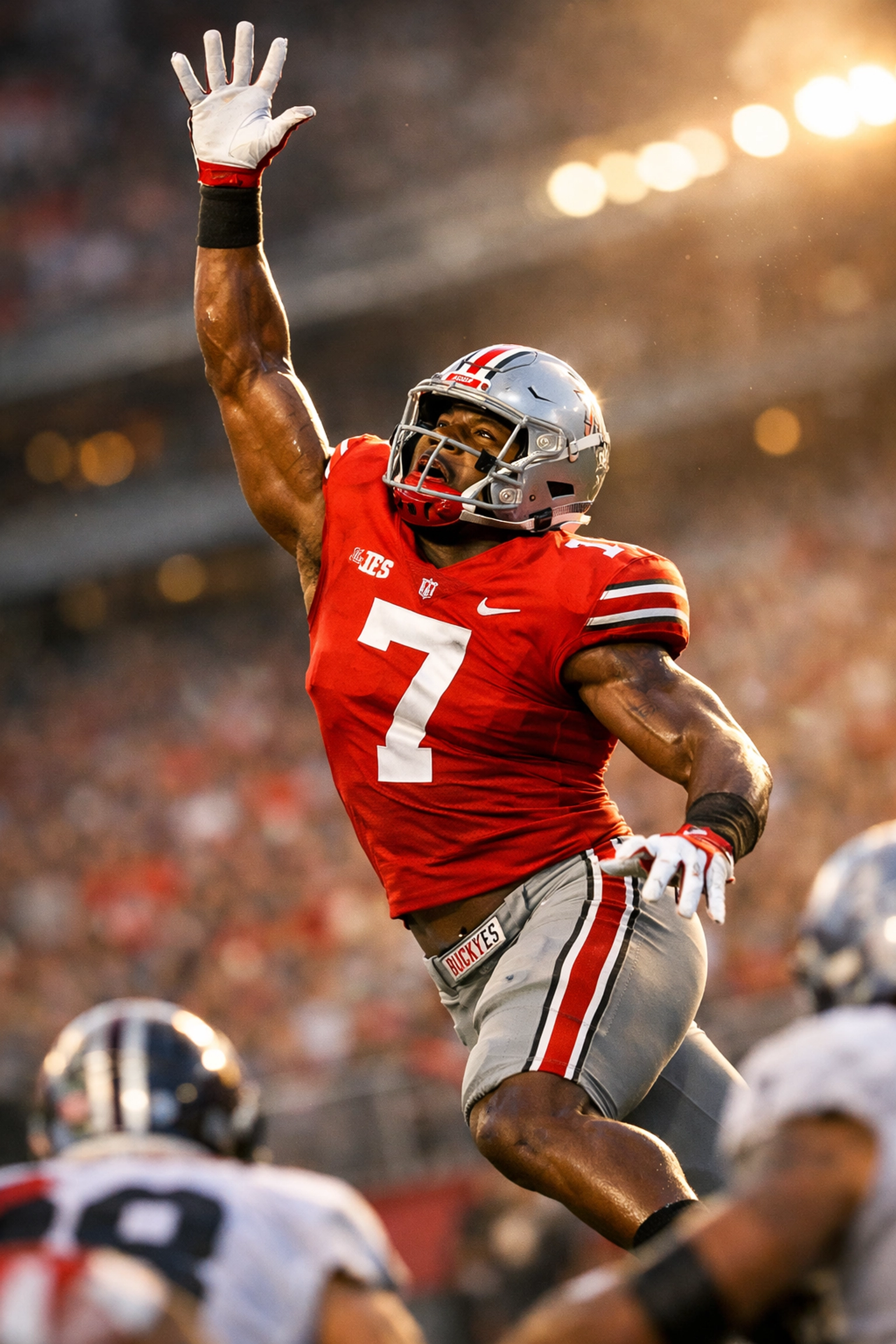 Ohio State Buckeyes defender showing athleticism deflecting pass at line of scrimmage