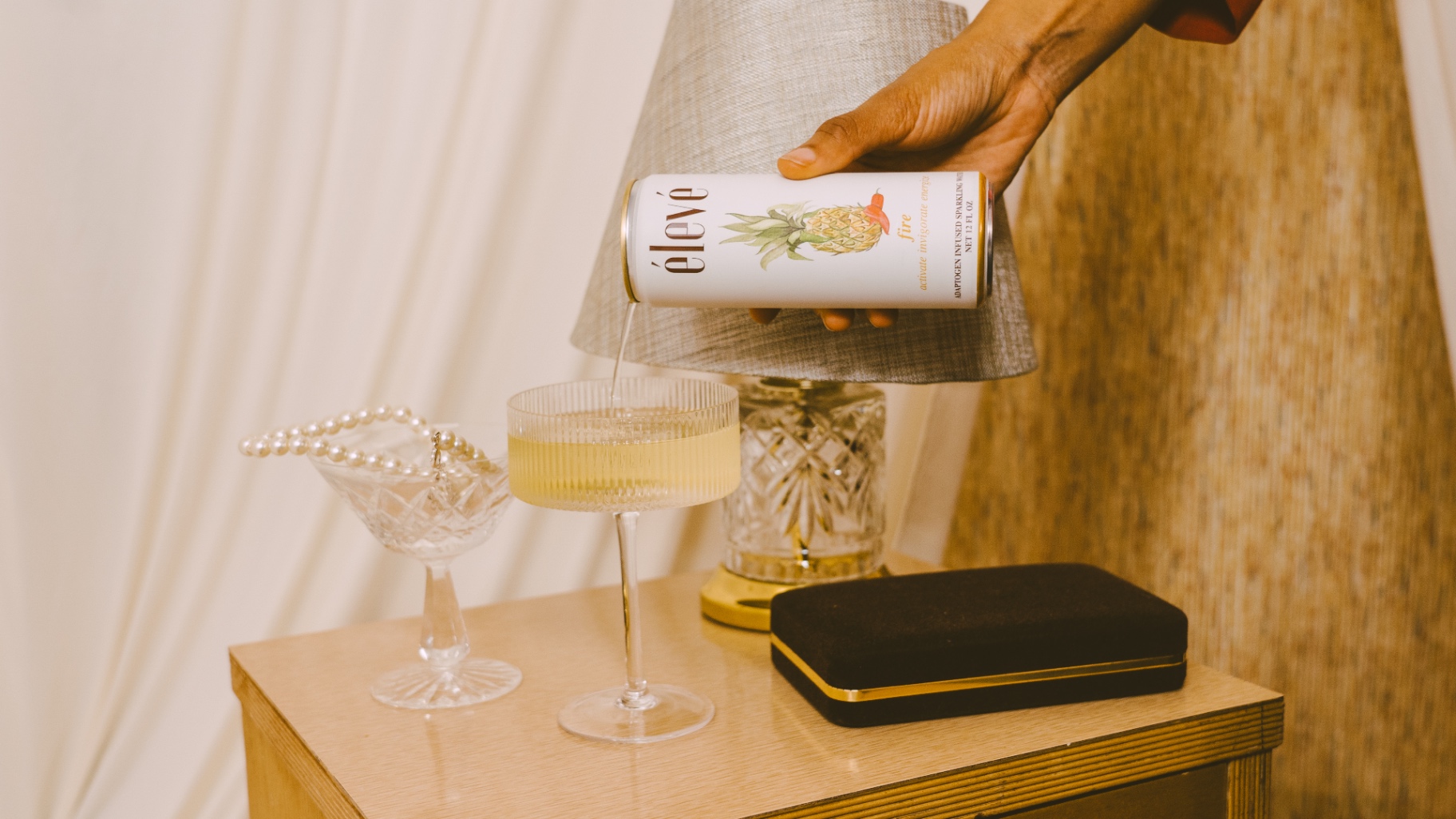 élevé fire adaptogen-infused sparkling water being poured