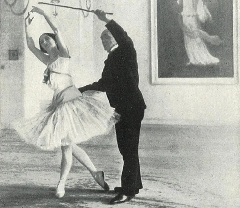 A ballet instructor guides a dancer in a classic pose at CWS Dance London