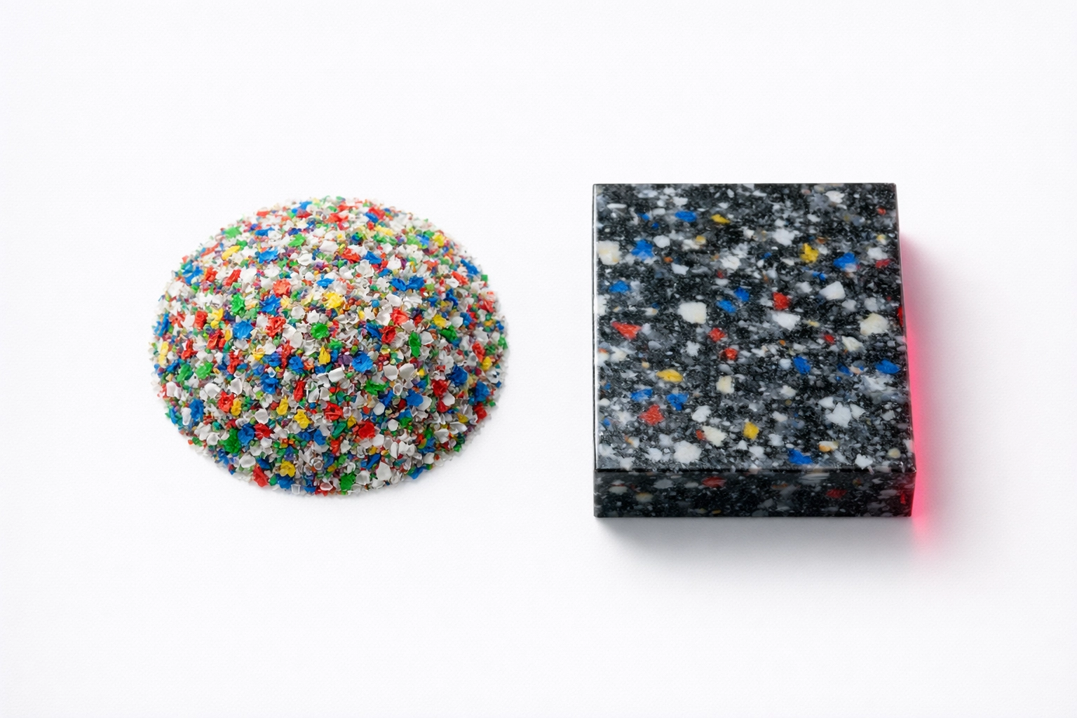 Shredded plastic waste next to a finished recycled plastic panel demonstrating circular economy manufacturing.
