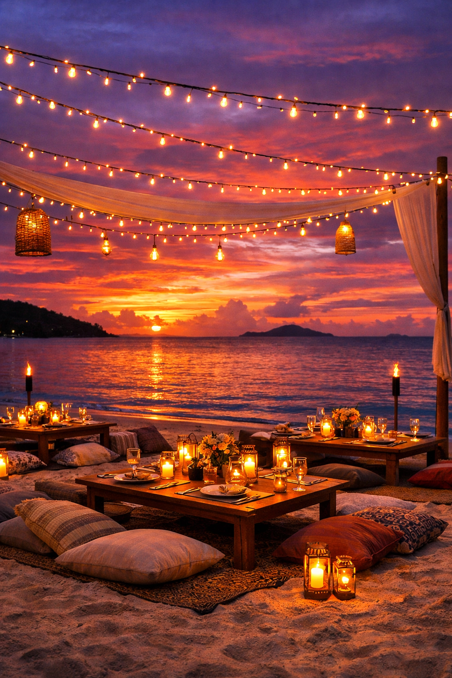 Romantic beachfront dining in Koh Samui under fairy lights at sunset, arranged by a personal travel consultant.
