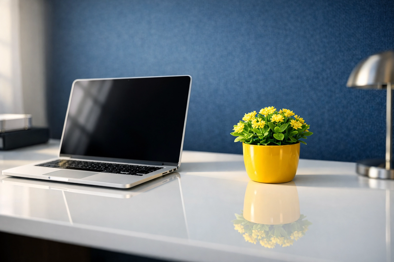 Clean and dust-free minimalist executive desk in Bedford illustrating the result of professional office cleaning.