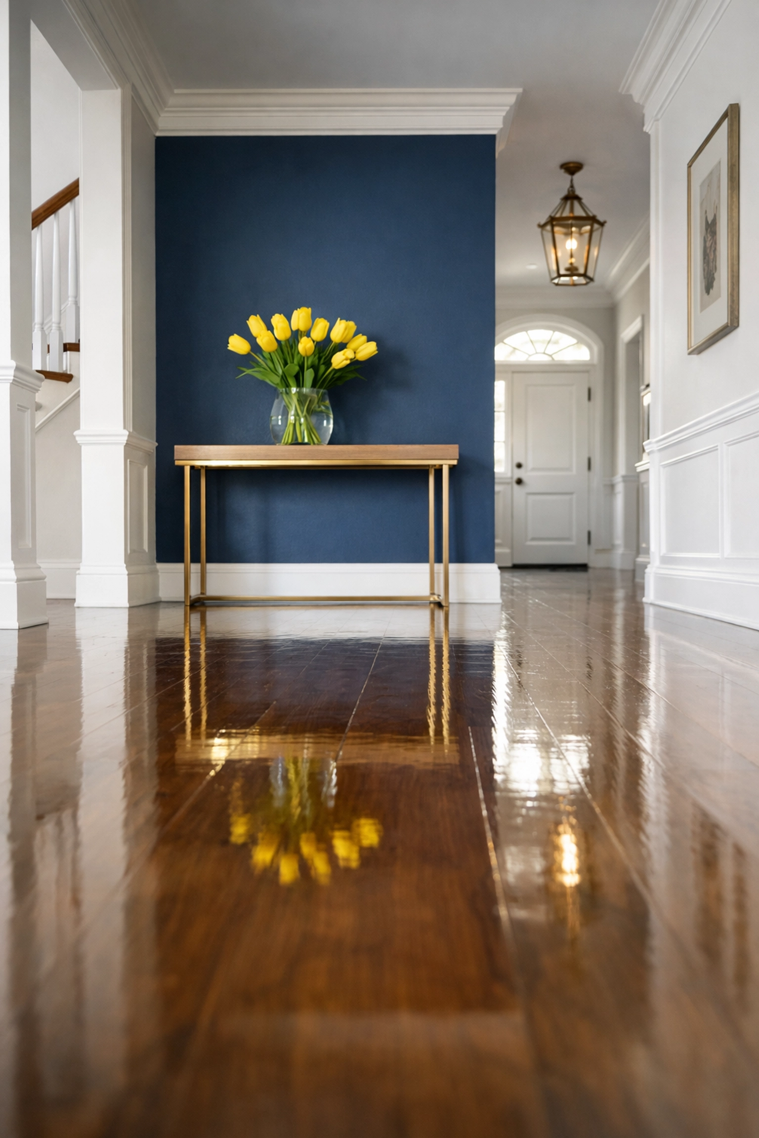 Gleaming waxed hardwood floors in a Wayland home entryway following a professional residential deep cleaning service.