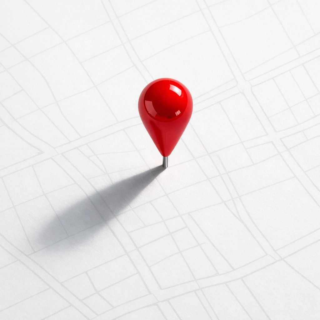 A red map pin on a minimalist grid symbolizing a targeted local SEO strategy for service businesses.