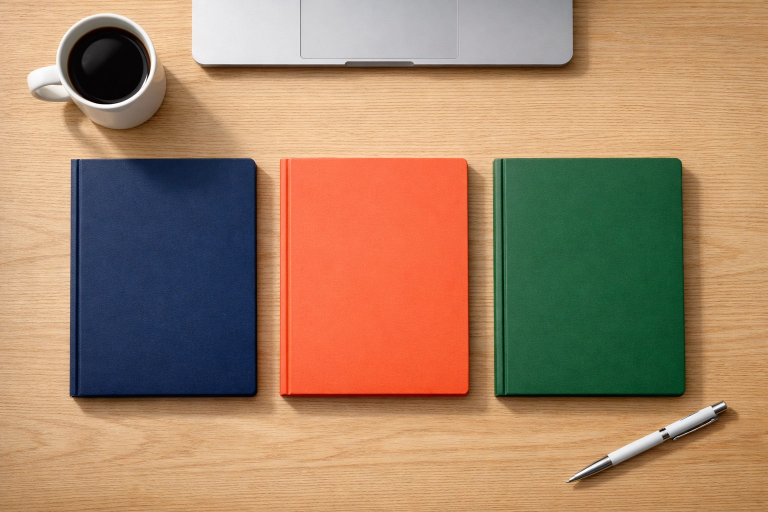 Three colored folders on desk representing content pillars for 365-day media strategy planning