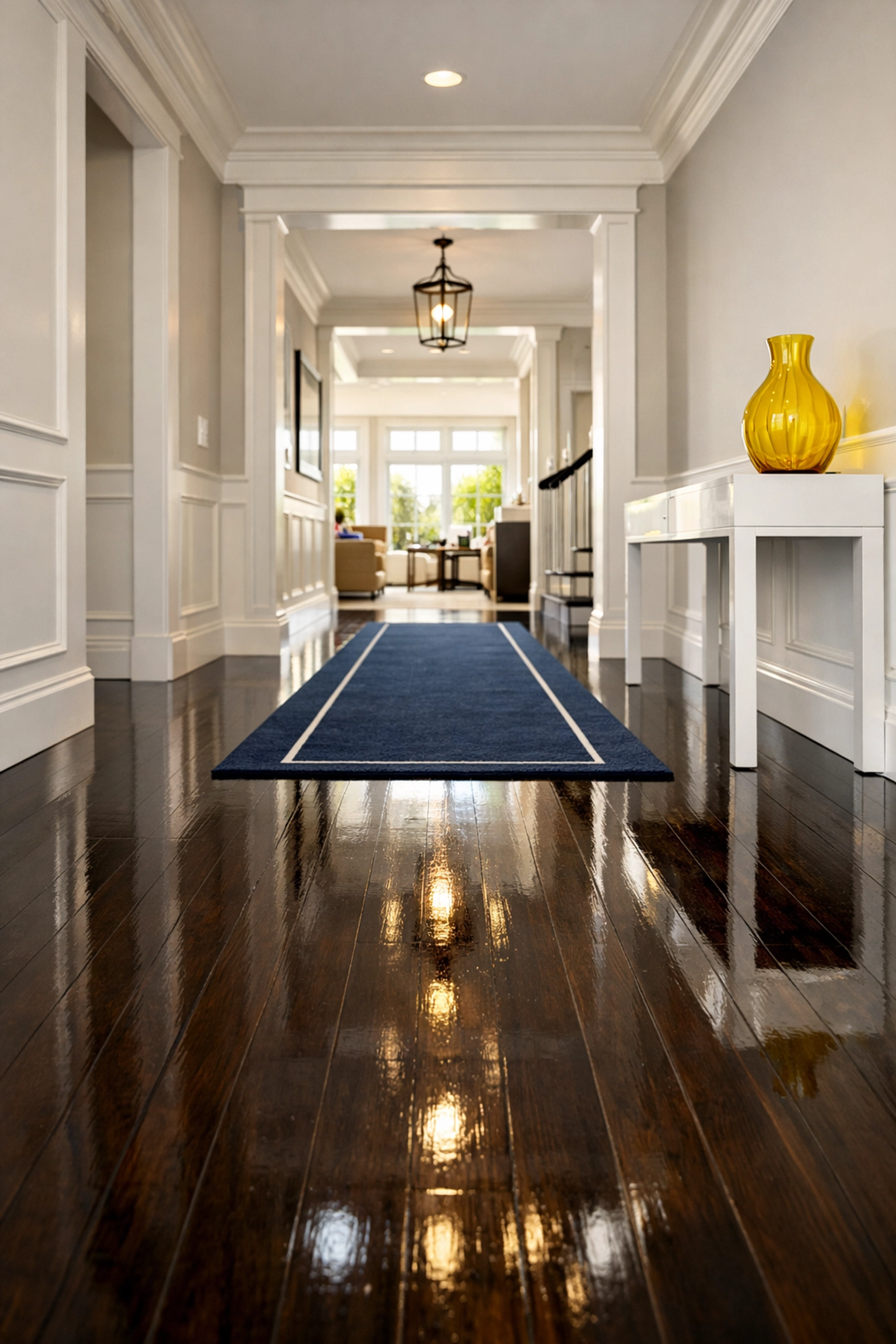 Gleaming wood entryway floors in a Lynnfield home following a professional house cleaning and sanitization.