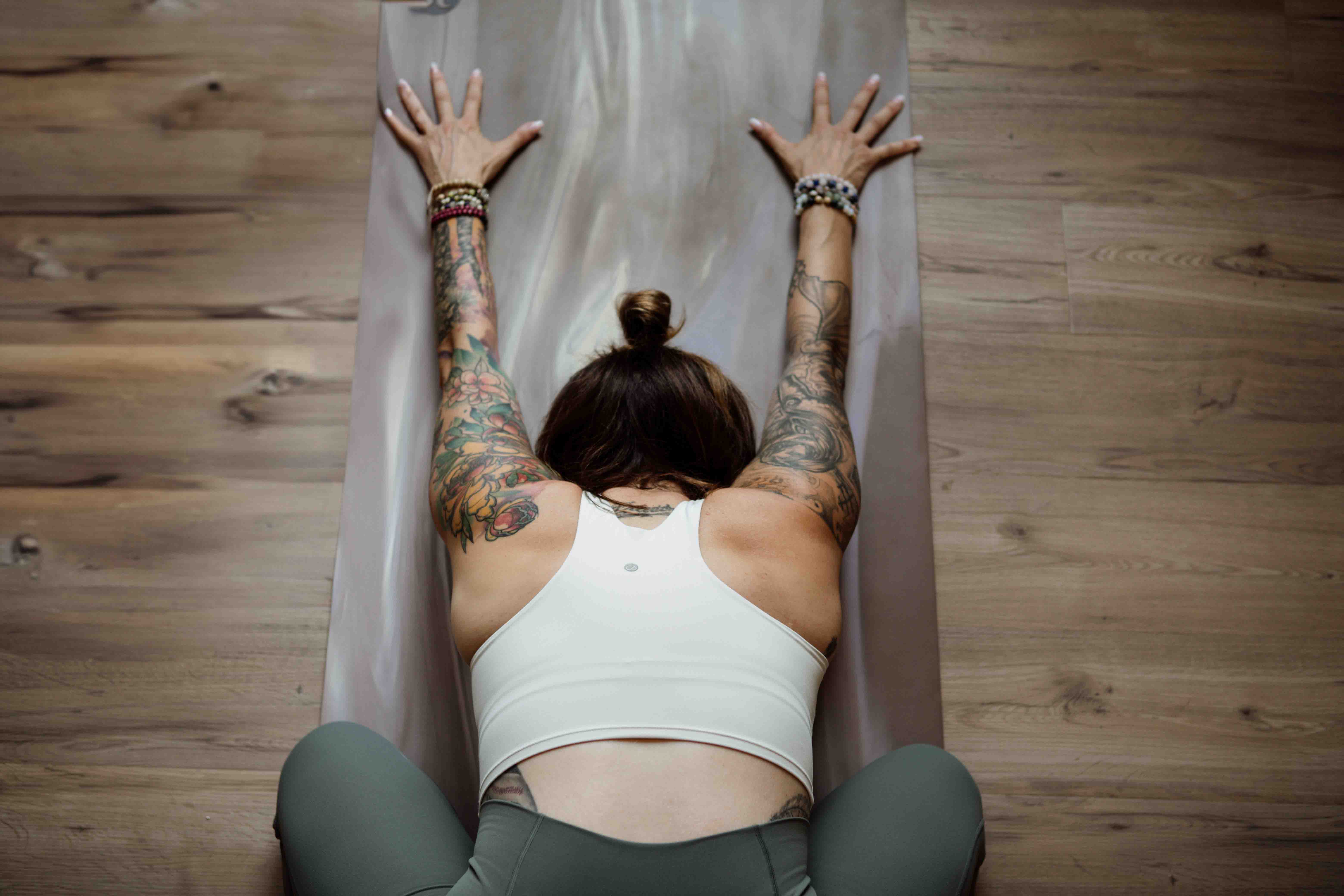 Woman practicing supported child's pose