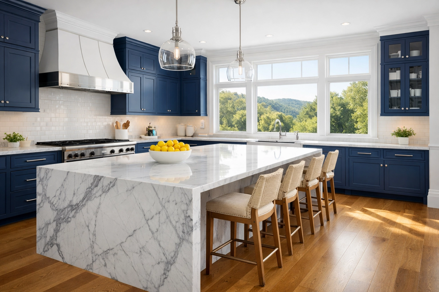 Spotless Winchester estate kitchen with marble island and navy cabinetry after luxury house cleaning.