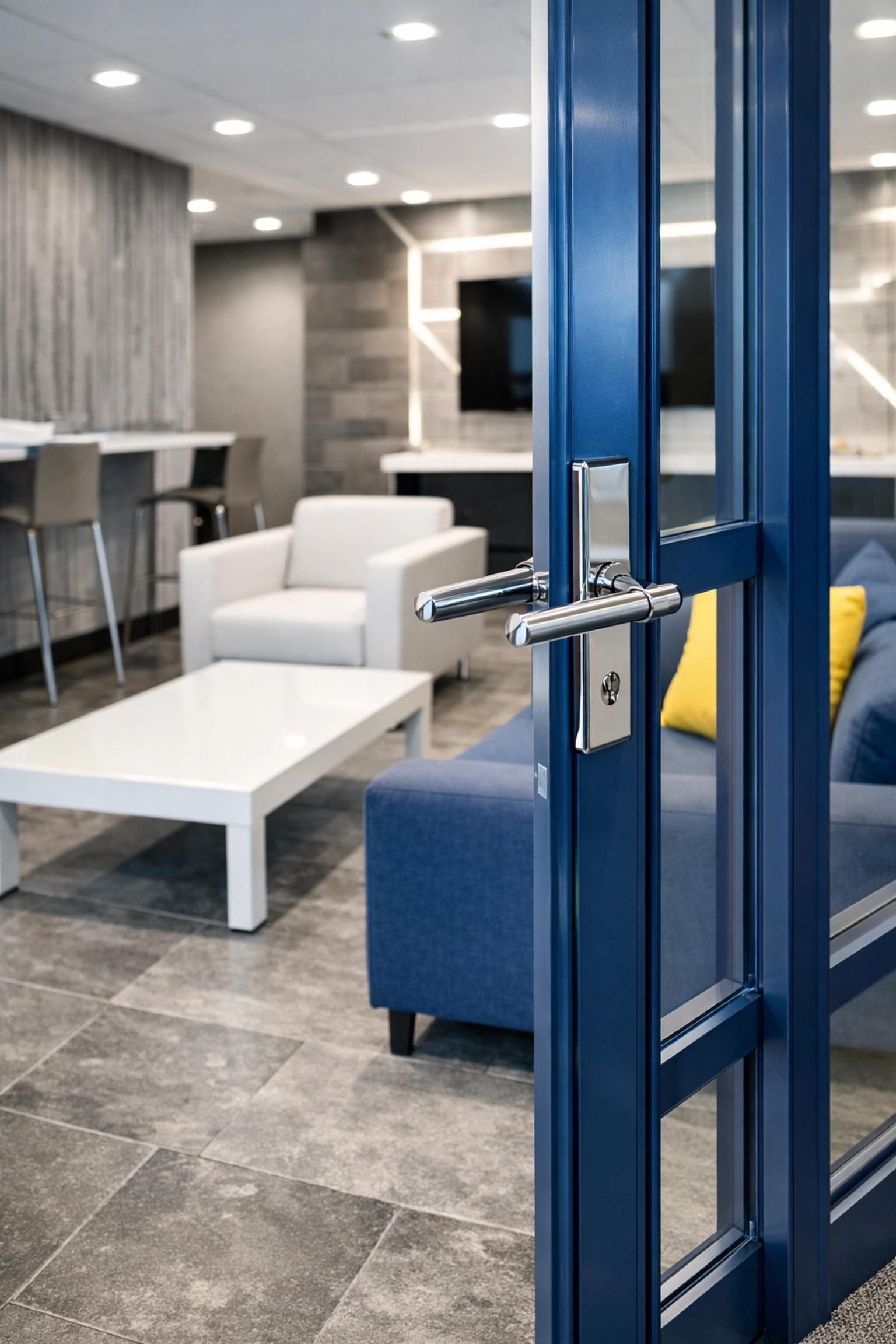 Premium Natick office lounge with expertly maintained floors and glass doors.