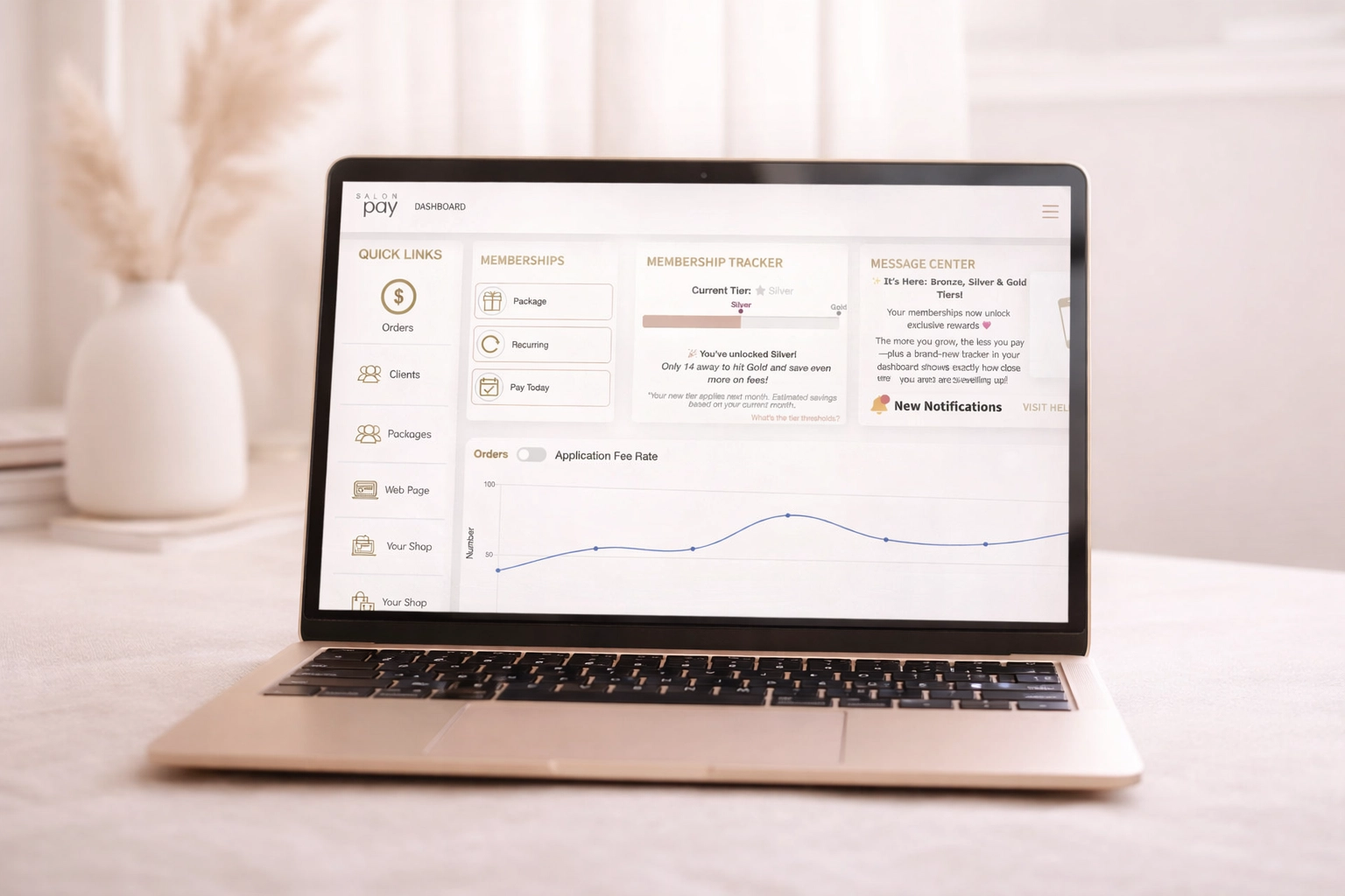 Salon Pay Dashboard Interface displayed on a modern laptop, featuring navigation for orders, clients, and membership tracker