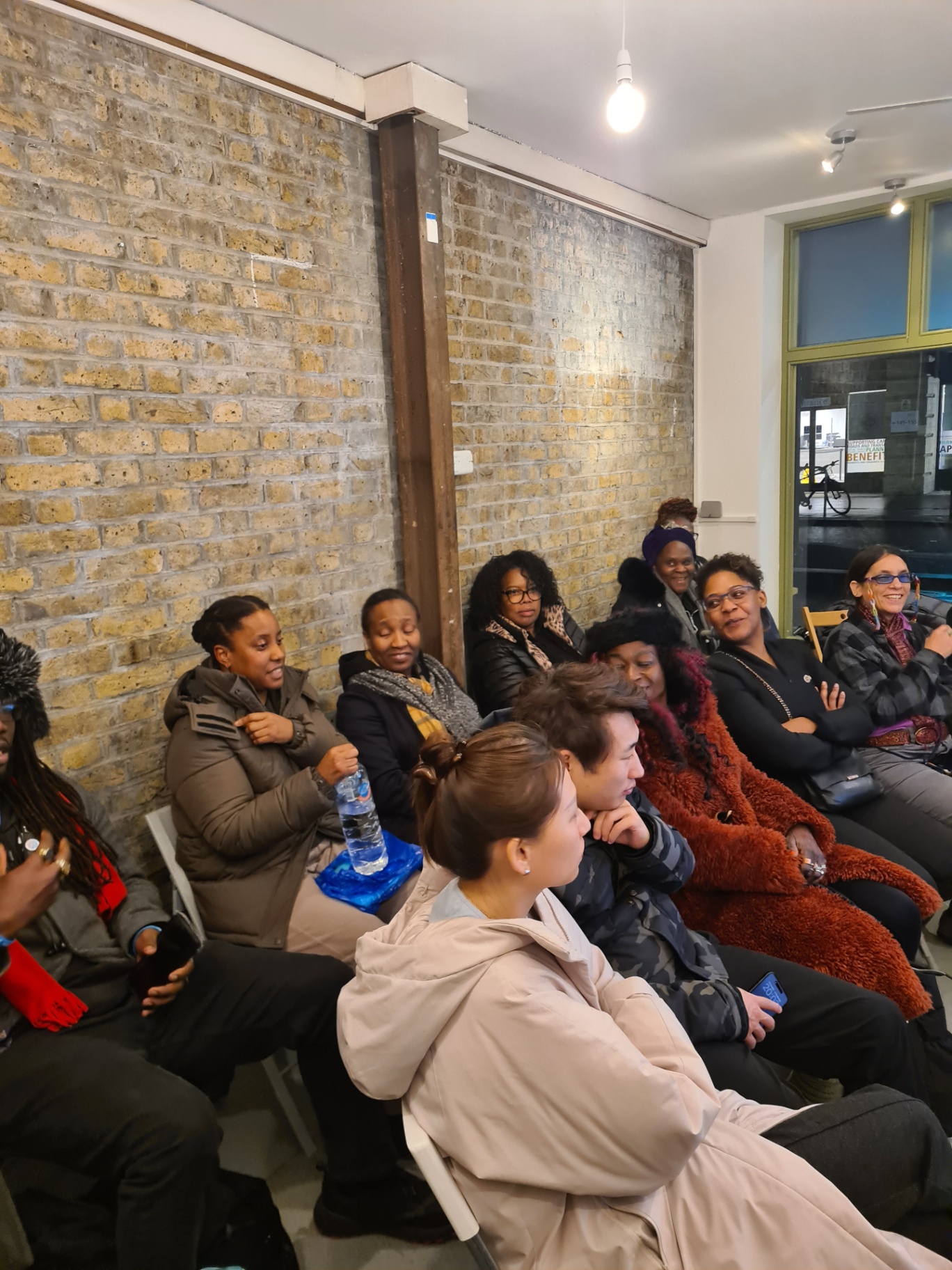 Guests gathered as a group for a relaxed, friendly wellness event at Health Defence Organics