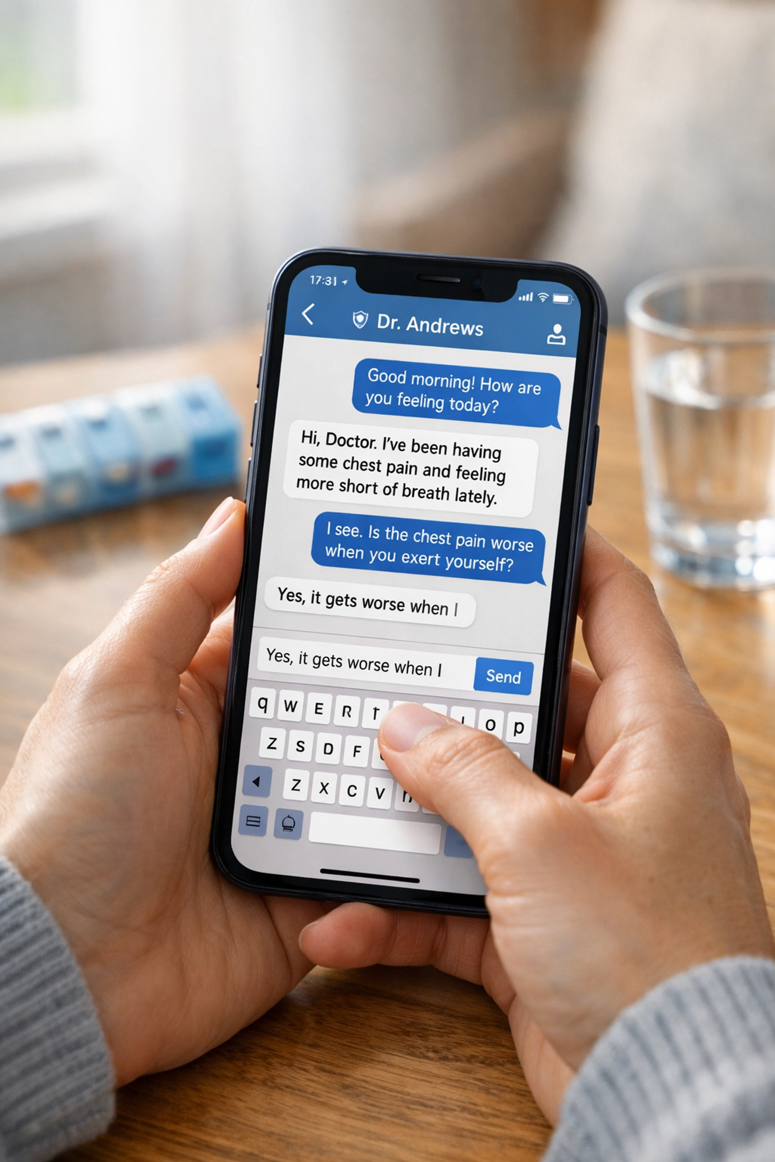 Patient texting online doctor for prescription refill from home with medication organizer nearby