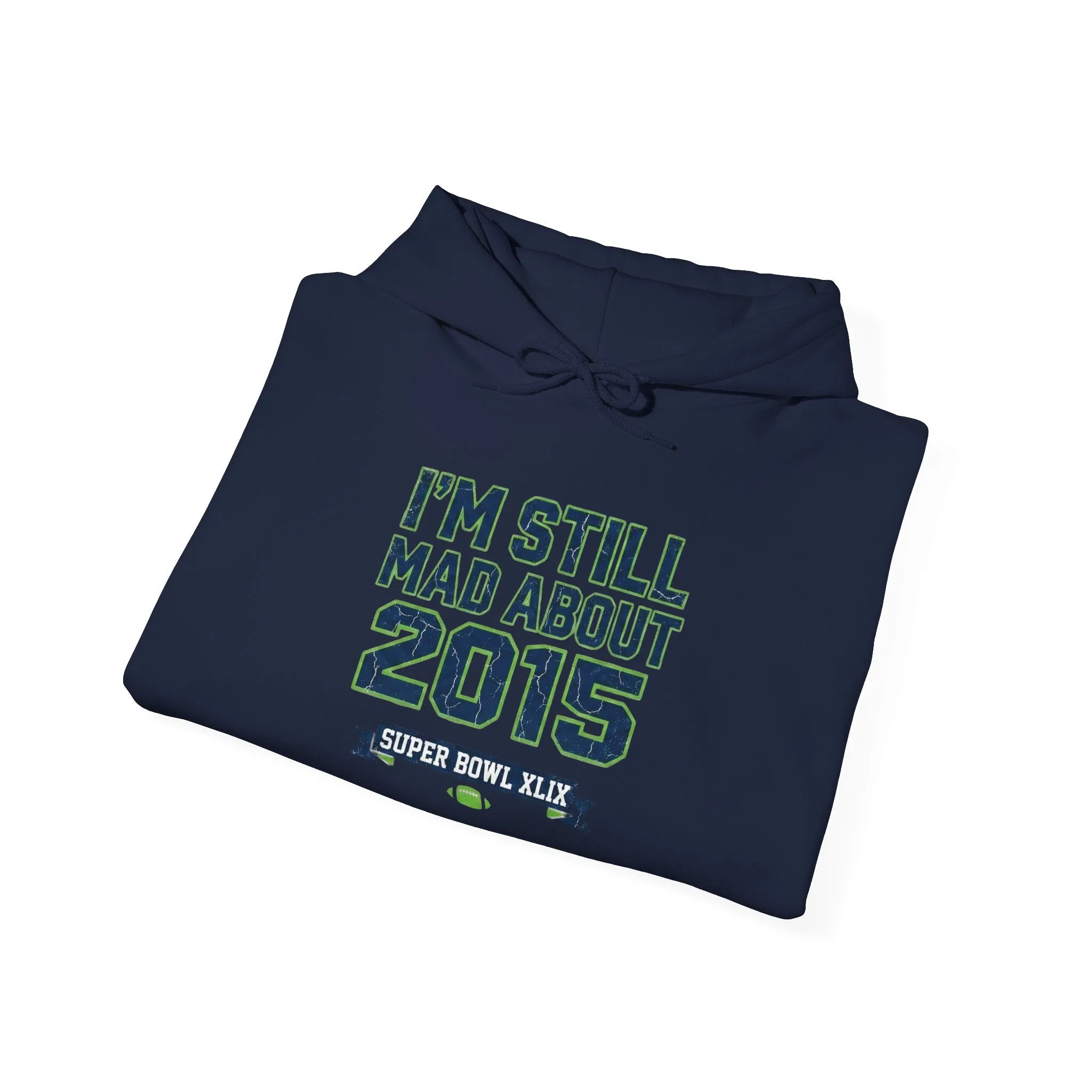 Navy blue hoodie featuring bold green text 'I'M STILL MAD ABOUT 2015' with 'SUPER BOWL XLIX'